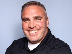 Smiling Jamie Wilson headshot photo